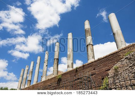 Temple of Venus and Roma ancient ruins and columns with clouds in the center of Rome