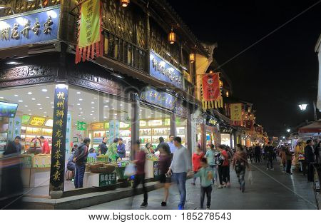 HANGZHOU CHINA - NOVEMBER 5, 2016: Unidentified people visit Qing He Fang historical street. is a protected area of the historical buildings from the Ming and Qing dynasty.