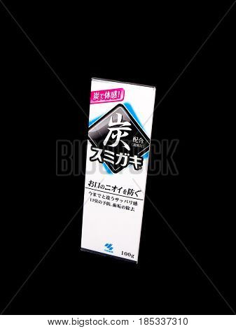 GOMEL, BELARUS - MARCH 5, 2017:Japanese toothpaste Kobayashi with charcoal.Kobayashi Pharmaceutical Co., Ltd. manufactures and sells OTC pharmaceuticals, oral hygiene products.