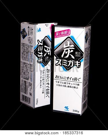 GOMEL, BELARUS - MARCH 5, 2017:Japanese toothpaste Kobayashi with charcoal.Kobayashi Pharmaceutical Co., Ltd. manufactures and sells OTC pharmaceuticals, oral hygiene products.