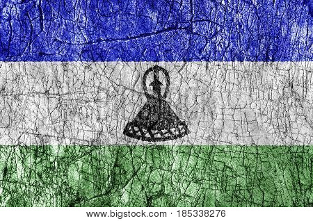 Grudge stone painted Lesotho flag close up