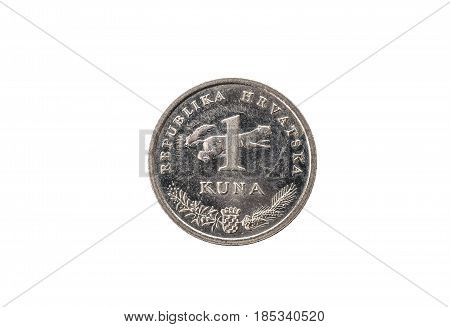 Old used and worn out 1 kuna coin. Coin of croatian currency for one kuna isolated on white. High resolution picture.