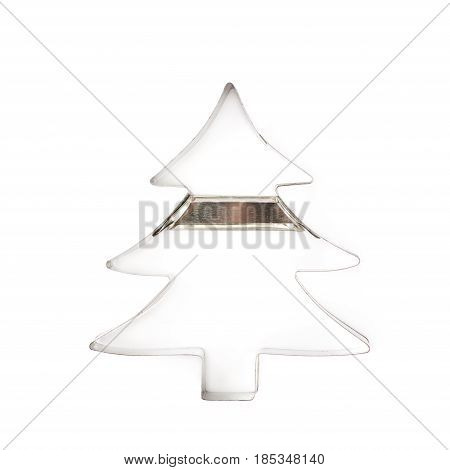 Christmax tree shaped cookie cutter isolated over the white background