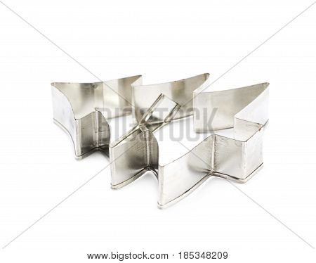 Christmax tree shaped cookie cutter isolated over the white background