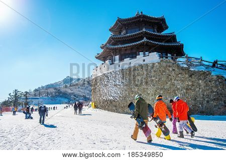 Tourists taking photos of the beautiful scenery and skiing around Deogyusan South Korea