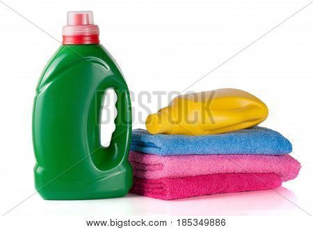 bottle laundry detergent and conditioner or fabric softener with towels isolated on white background.