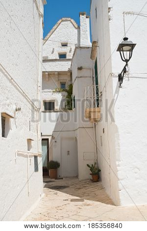 Characteristic alleyway of Locorotondo. Puglia. Southern Italy.