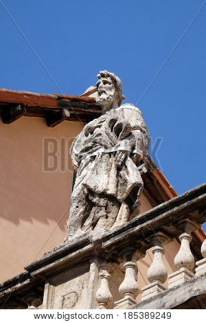 ROME, ITALY - SEPTEMBER 03: Statue of Apostle on the church dei Santi XII Apostoli in Rome, Italy on September 03, 2016.
