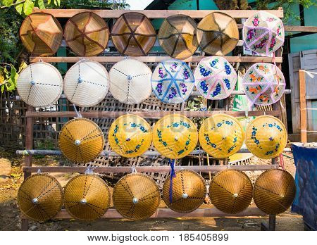 Traditional hats at the street market, Mingun, Mandalay region, Myanmar. (Burma)