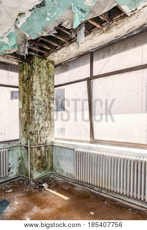 Water damaged ceiling -Panels damaged huge hole in roof from rainwater leakage