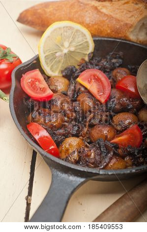 Baby Cuttle Fish Roasted On Iron Skillet