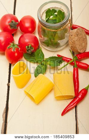 Italian Pasta Paccheri With Tomato Mint And Chili Pepper