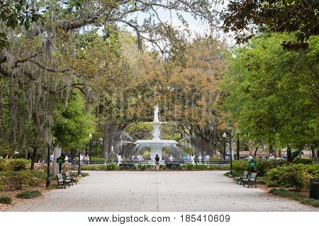 Savannah GA - March 27 2017: Forsyth Park is the largest park in Savannah's historic district and a famous tourist destination. The fountain dates to 1858 and is symbolic of Savannah.