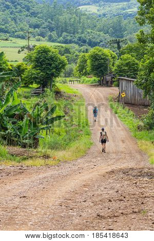 Trekking In Dirt Road