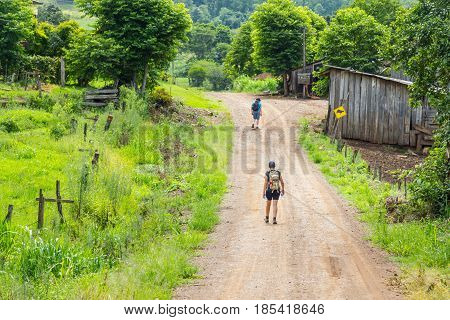 Trekking In Dirt Road