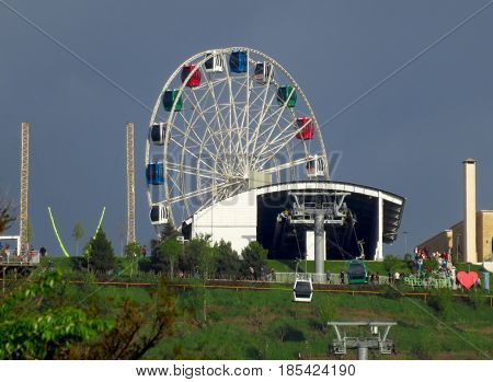 ALMATY KAZAKHSTAN - MAY 7 2017: Ferris wheel at Koktobe hill Almaty Kazakhstan