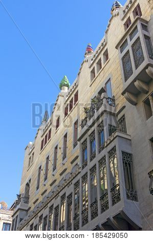 Beautiful Facade Of The Palace Guell By Gaudi­ In Barcelona, Spain