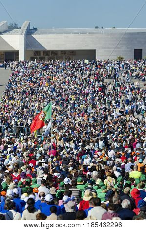 Fatima Portugal - May 13 2014: Pilgrims at the Sanctuary of Fatima during the celebrations of the apparition of the Virgin Mary in Fatima Portugal.