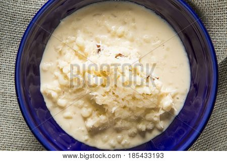 Brazilian Dessert Canjica Our Mungunza Of White Corn In Blue Bowl