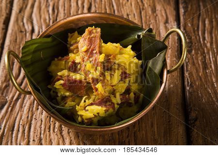Dried Meat With Rice In An Old Copper Pot - Traditional Bahia Food