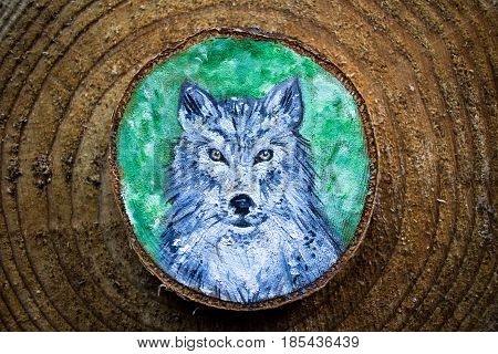 Painted Forest Animal On A Cut Piece Of Wood. Beautiful Natural Paint Colors. Background Of Brown Wo