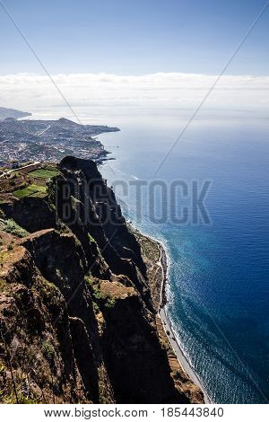 Madeira island, Portugal. Landscape on the Southern Coast Cabo Girao, Atlantic Ocean and Funchal.