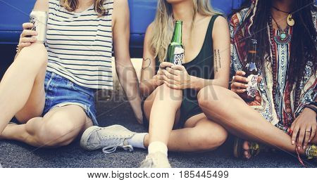 Friends Drinking Alcohol Beers Together on Road Trip Journey
