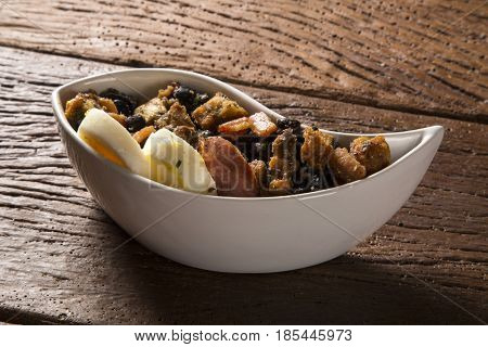 Delicious appetizer of tropeiro beans. Typical food in Brazil