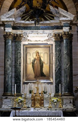 ROME, ITALY - SEPTEMBER 03: Our Lady altarpiece by Domenico Bartolini in Chapel of the Miraculous Madonna, Basilica di Sant Andrea delle Fratte, Rome, Italy on September 03, 2016.