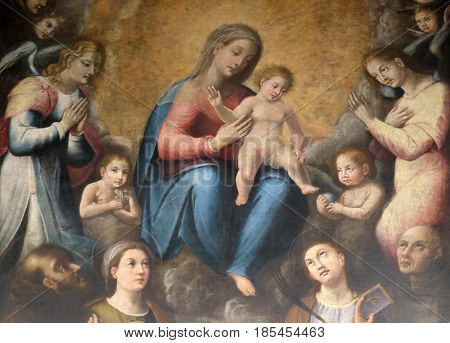 ROME, ITALY - SEPTEMBER 03: Madonna and Child with Saints in Chapel of Our Lady, Basilica di Sant Andrea delle Fratte, Rome, Italy on September 03, 2016