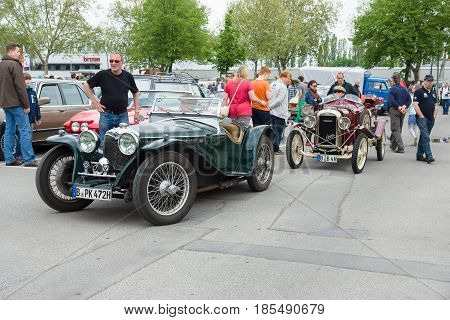 Berlin - May 11: French Retro Car Amilcar (ecurie Sidecar) And English Retro Cars Riley Mph 15-6 In