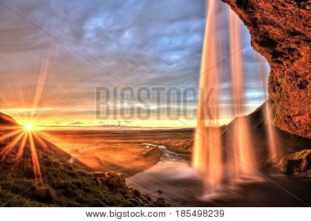 Seljalandfoss Waterfall at Direct Sunset in Iceland