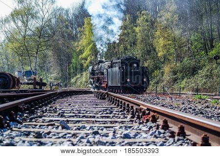 BOCHUM , GERMANY - APRIL 18 2015 : Steam train passing the station in Bochum-Dahlhausen