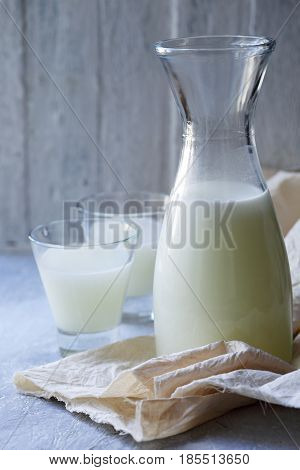Homemade serum in a Pitcher in rustic style