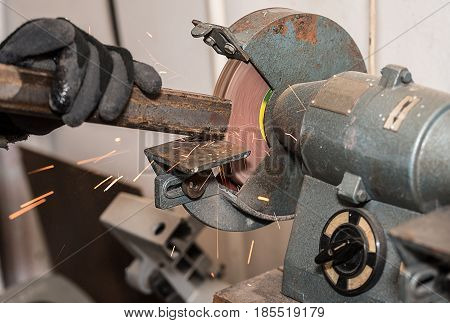 Industrial Metal Worker Use The Grinding Machine