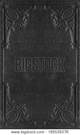 old vintage book cover with decorative patterns