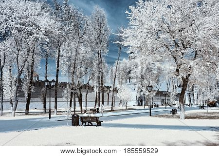 The landscape is shot on a specially installed camera on which a filter is installed that does not allow the visible range of light to be visible. But only infrared radiation. With this shooting the grass and foliage of the trees in white pink or red colo