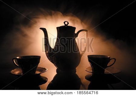 Food Background Tea And Coffee Theme. Old Vintage Ceramic Tea Or Coffee Pot With Cups Jug And Sugar
