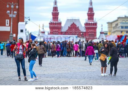 Moscow, Russia - May, 7, 2017: Tourists photograph on Red Square in a center of Moscow
