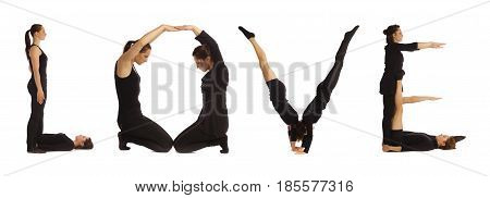 Black dressed people forming word LOVE on white background