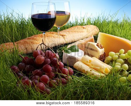 Cheese Platter And Wine With Different Cheese And Grapes