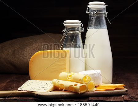 Milk Products - Tasty Healthy Dairy Products And Milk Jar, Glass Bottle And Cheese Platter