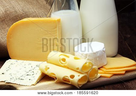 Milk Products - Tasty Healthy Dairy Products And Milk Jar, Glass Bottle And Cheese Platter