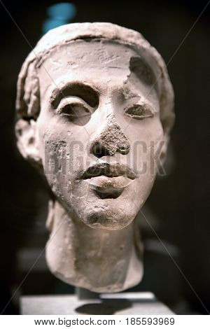 BERLIN GERMANY - APRIL 7: Head of a statue of pharaoh Akhenaten (Amenhotep IV) in Egyptian museum on April 7 2017 in Berlin