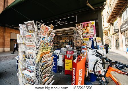 PARIS FRANCE - MAY 9 2017: INternational press newspapers front pages with the picture of the newly elected French president Emmanuel Macron after the second round French Presidential election