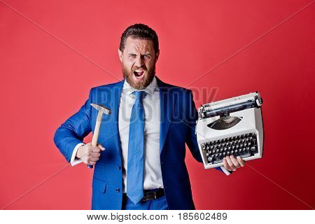 Business Man, Aggressive Businessman With Typewriter And Hammer