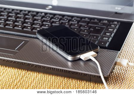 Business Notebook with wire connected cell phone