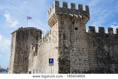 TROGIR, CROATIA - OCTOBER 20, 2016: The walls of ancient venetian Camerlengo fortress in Trogir, Croatia