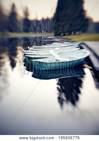 The boathouse station in the evening on the lake. Photo taken with Lensbaby