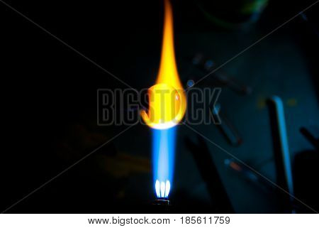 Birth of glass bead in hot fire